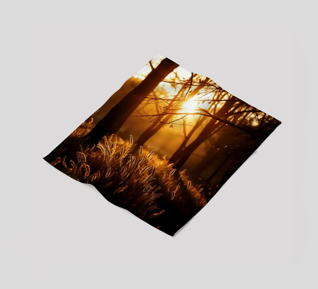 Golden sunlight filters through trees in a tranquil forest fleece blanket by DesignDoodle