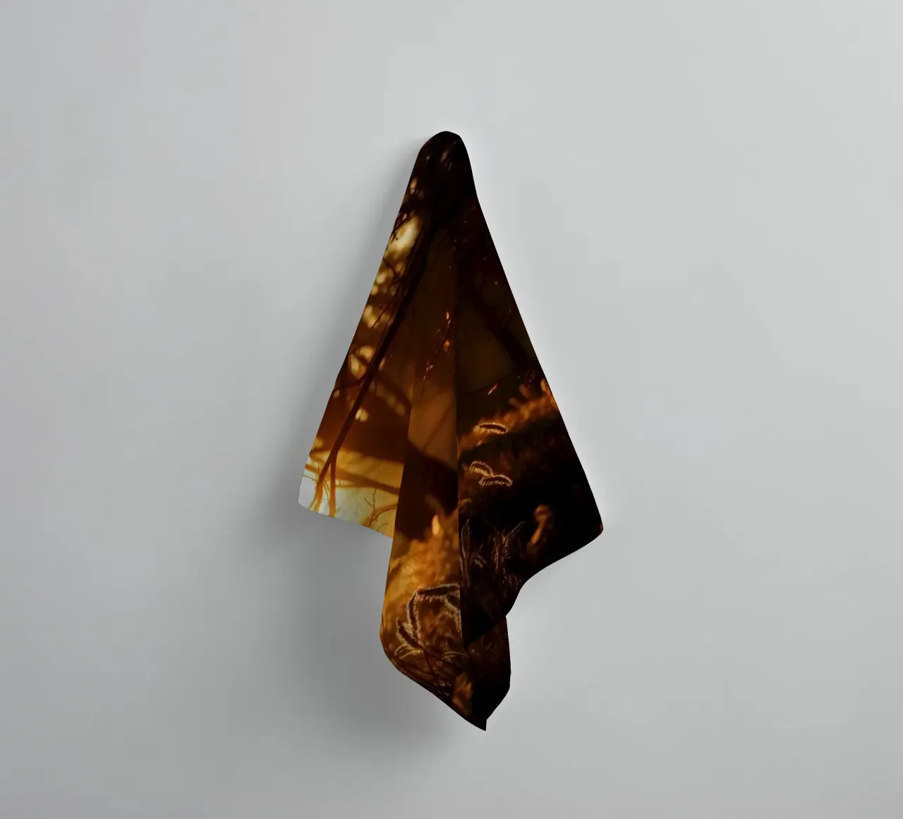 Golden sunlight filters through trees in a tranquil forest towel by DesignDoodle