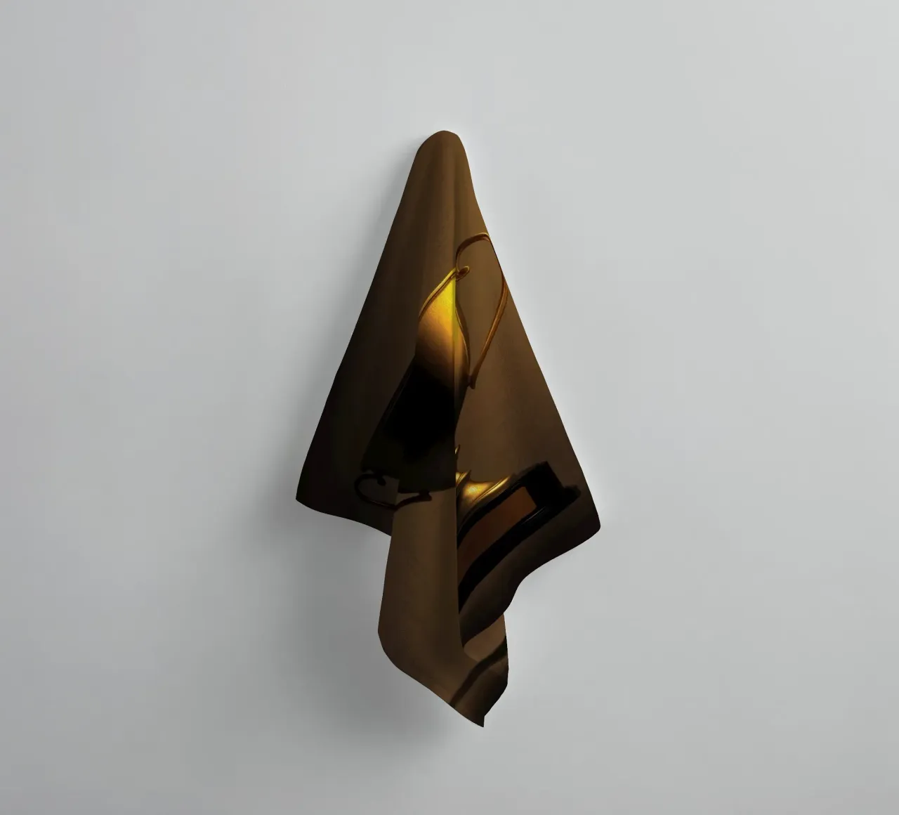 Goldene Trophäe mit sanftem Licht zur Präsentation der Leistung Handtuch von DesignDoodle