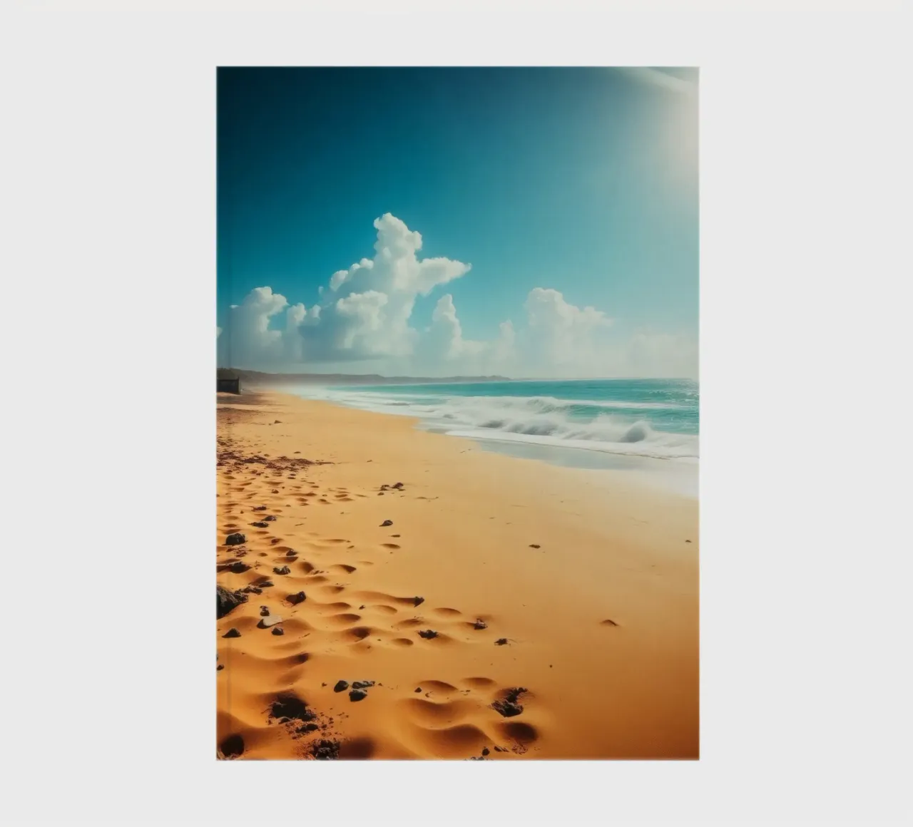 Golden sand beach with gentle waves and sunny sky notebook by DesignDoodle