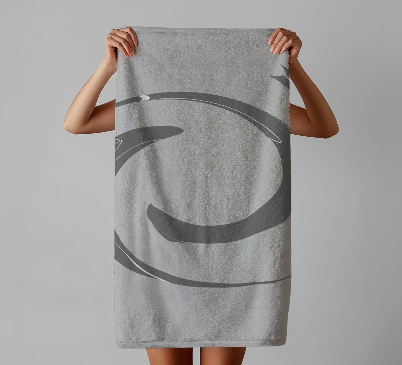 Abstract dynamic round patterns in grey towel by Something for you