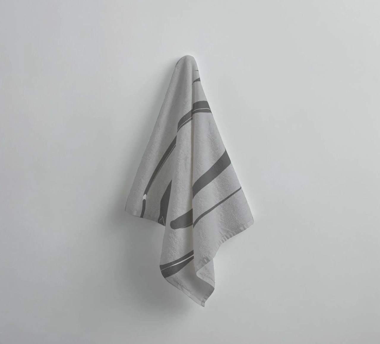 Abstract dynamic round patterns in grey towel by Something for you
