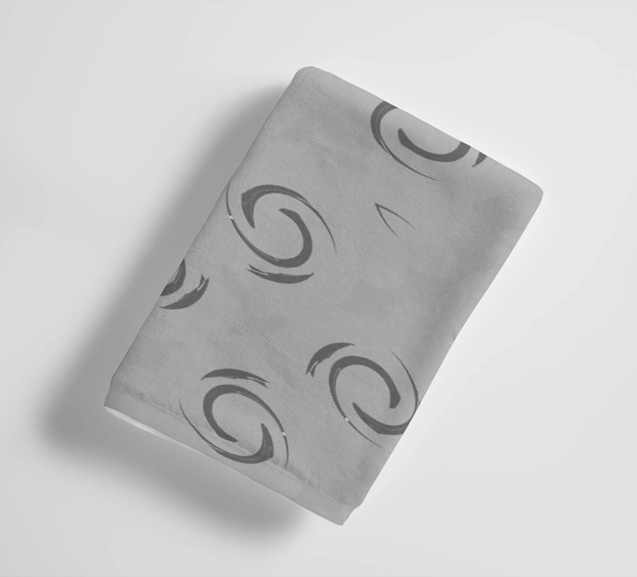 Abstract dynamic circular pattern in grey towel by Something for you