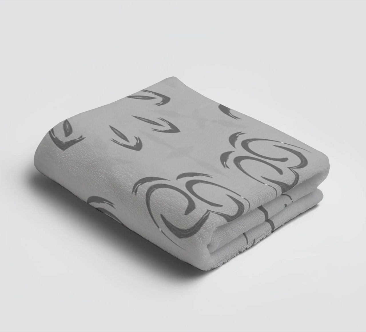 Abstract dynamic circular pattern in grey towel by Something for you