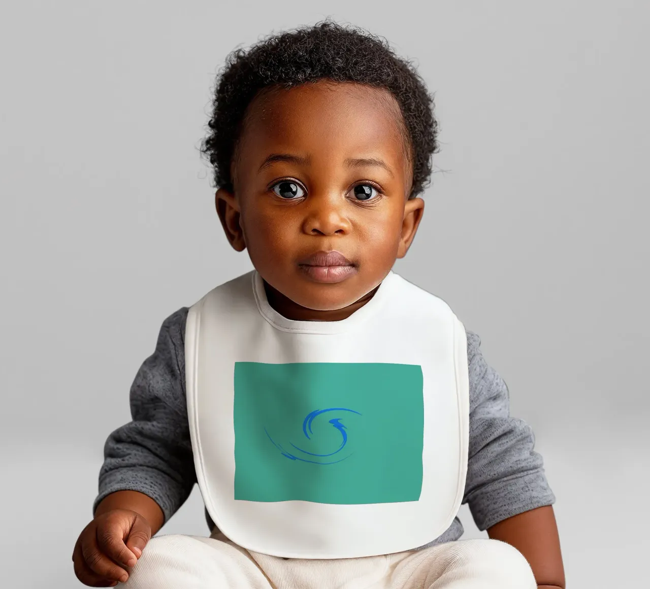 Abstract circular dynamic shape in blue baby bib by Something for you