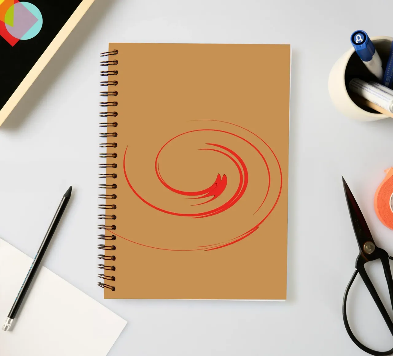 Abstract circular dynamic shape in red and orange spiral notebook by Something for you