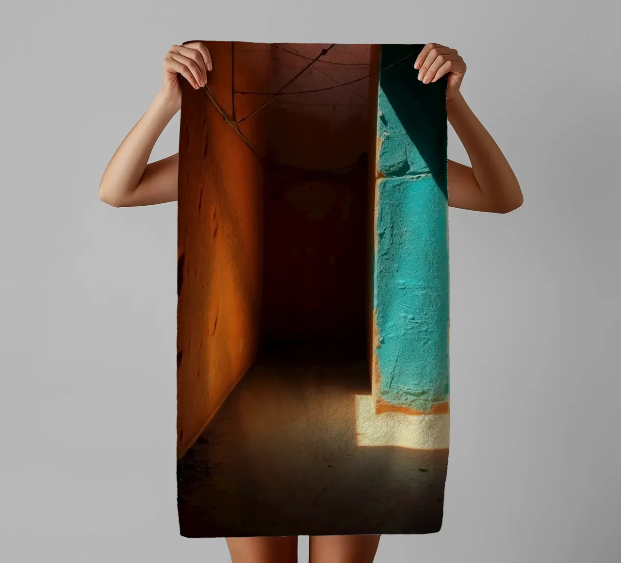 A corridor showcases a striking contrast with orange and tur towel by DesignDoodle