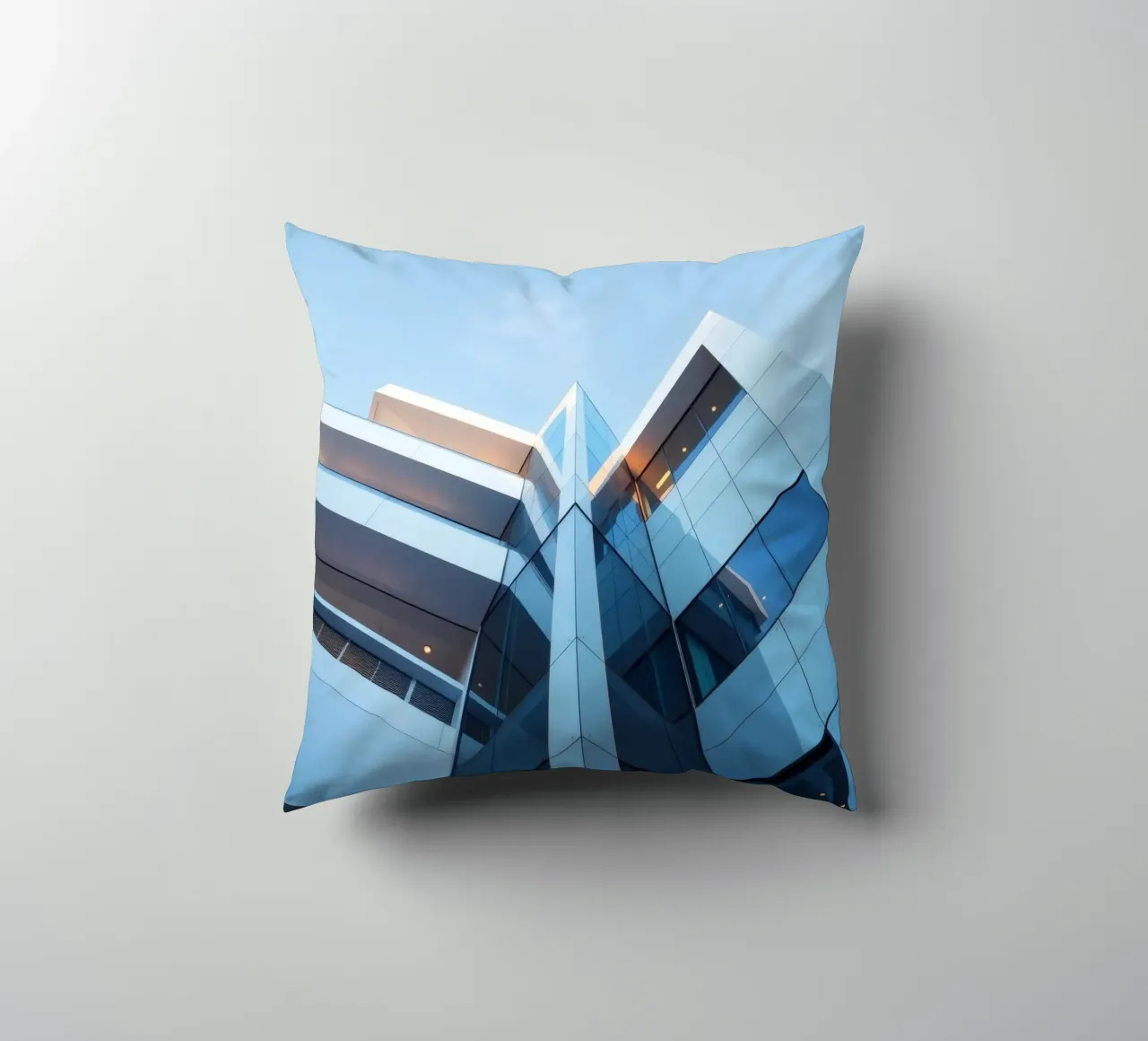 Modern architectural design featuring glass and concrete decorative cushion by DesignDoodle