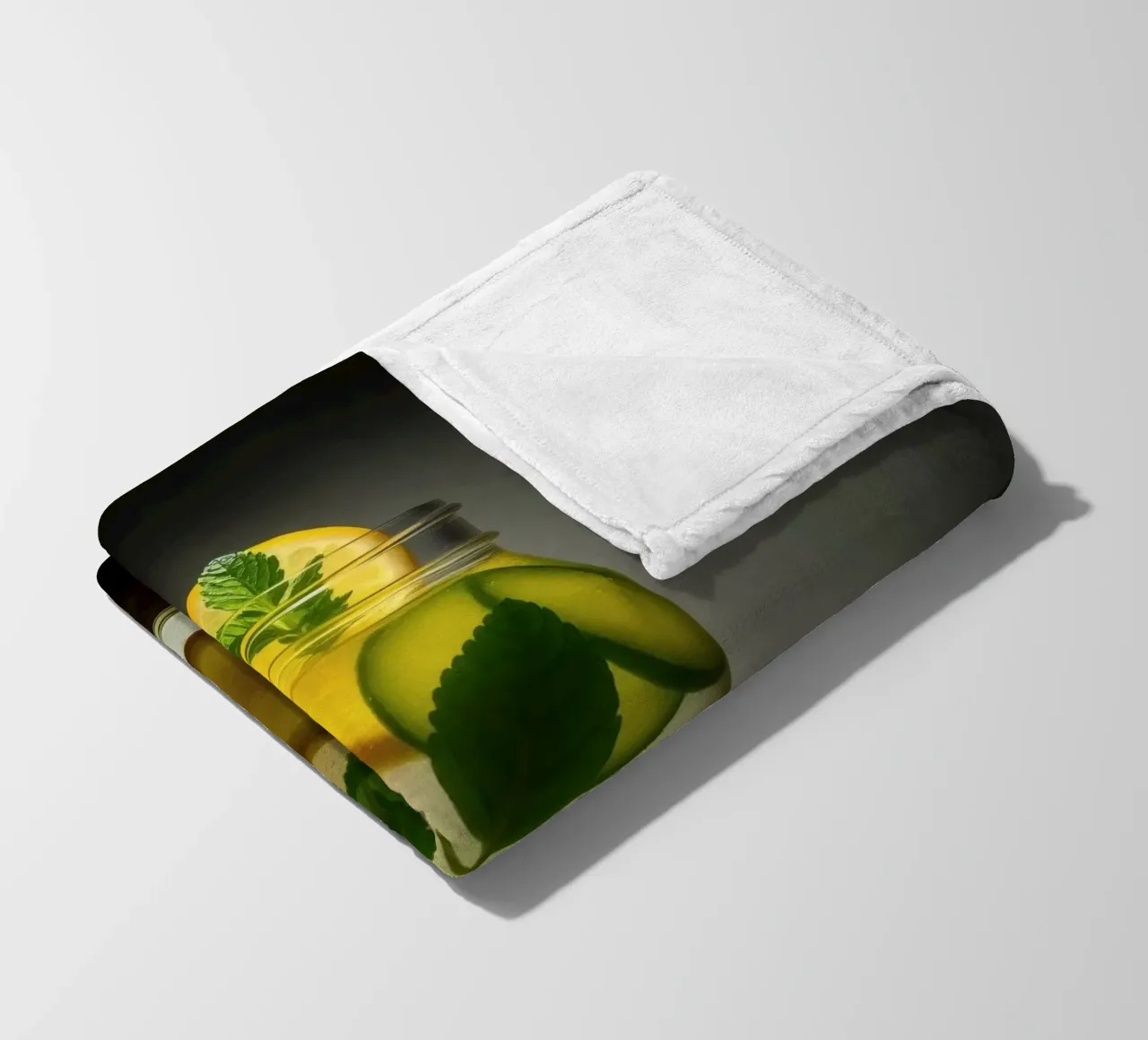 Refreshing lemonade with mint leaves and cucumber slices fleece blanket by DesignDoodle