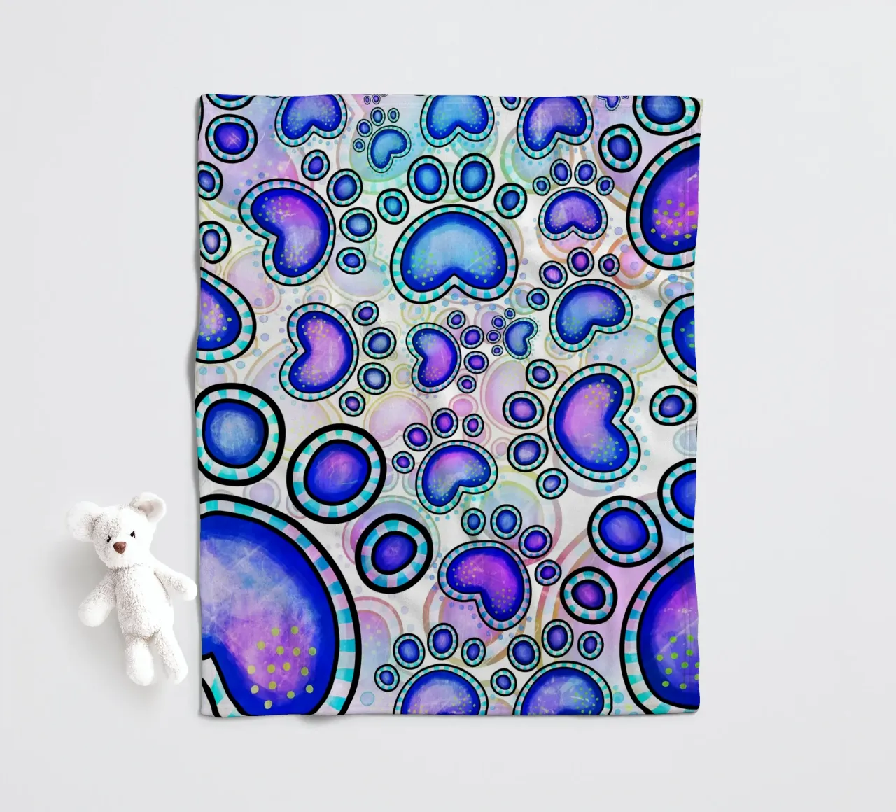 Doodle Paw Print Parade fleece blanket by Happy Littles