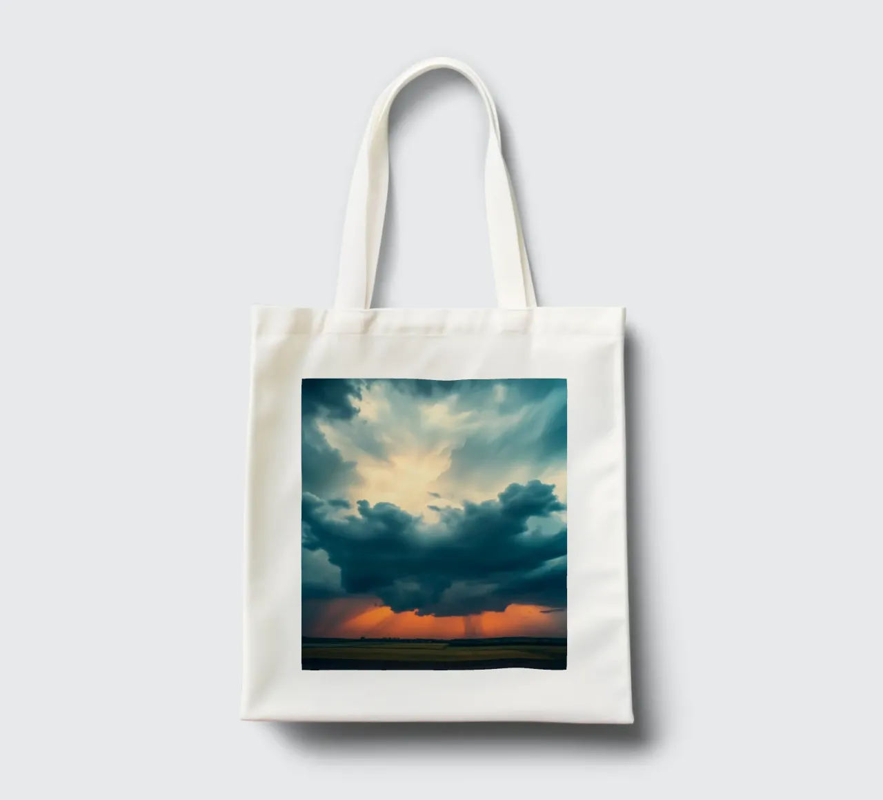 Dramatic sunset sky over open fields with towering clouds tote bag by DesignDoodle