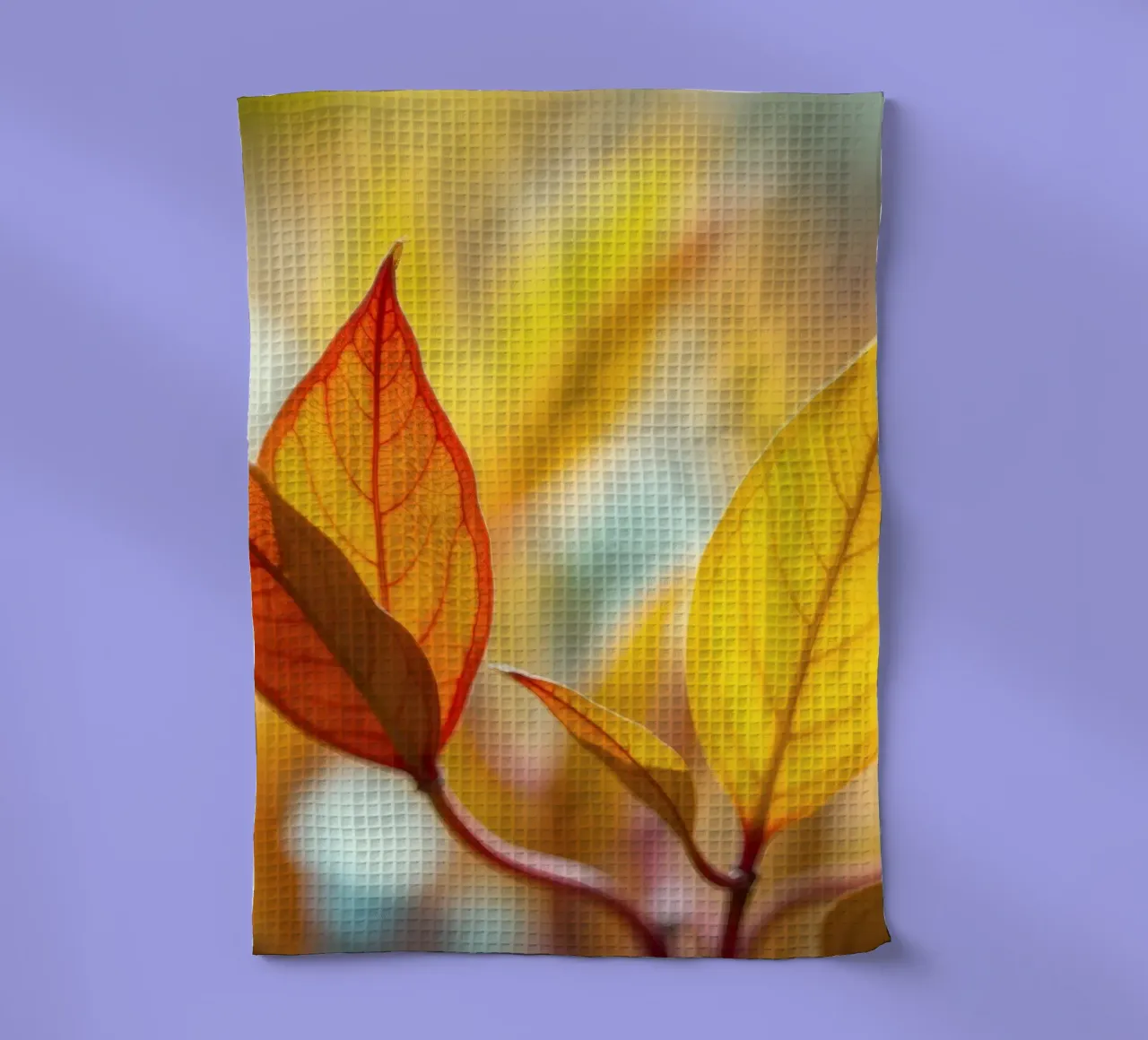 des feuilles d'automne dans les tons orange et jaune torchon de DesignDoodle