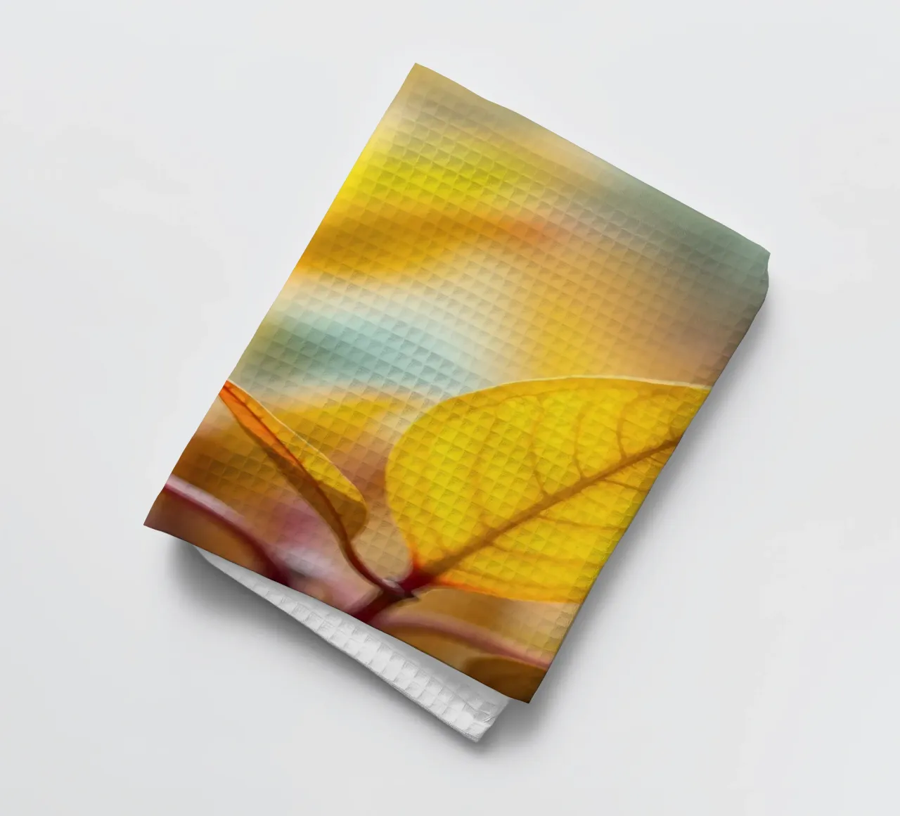 des feuilles d'automne dans les tons orange et jaune torchon de DesignDoodle