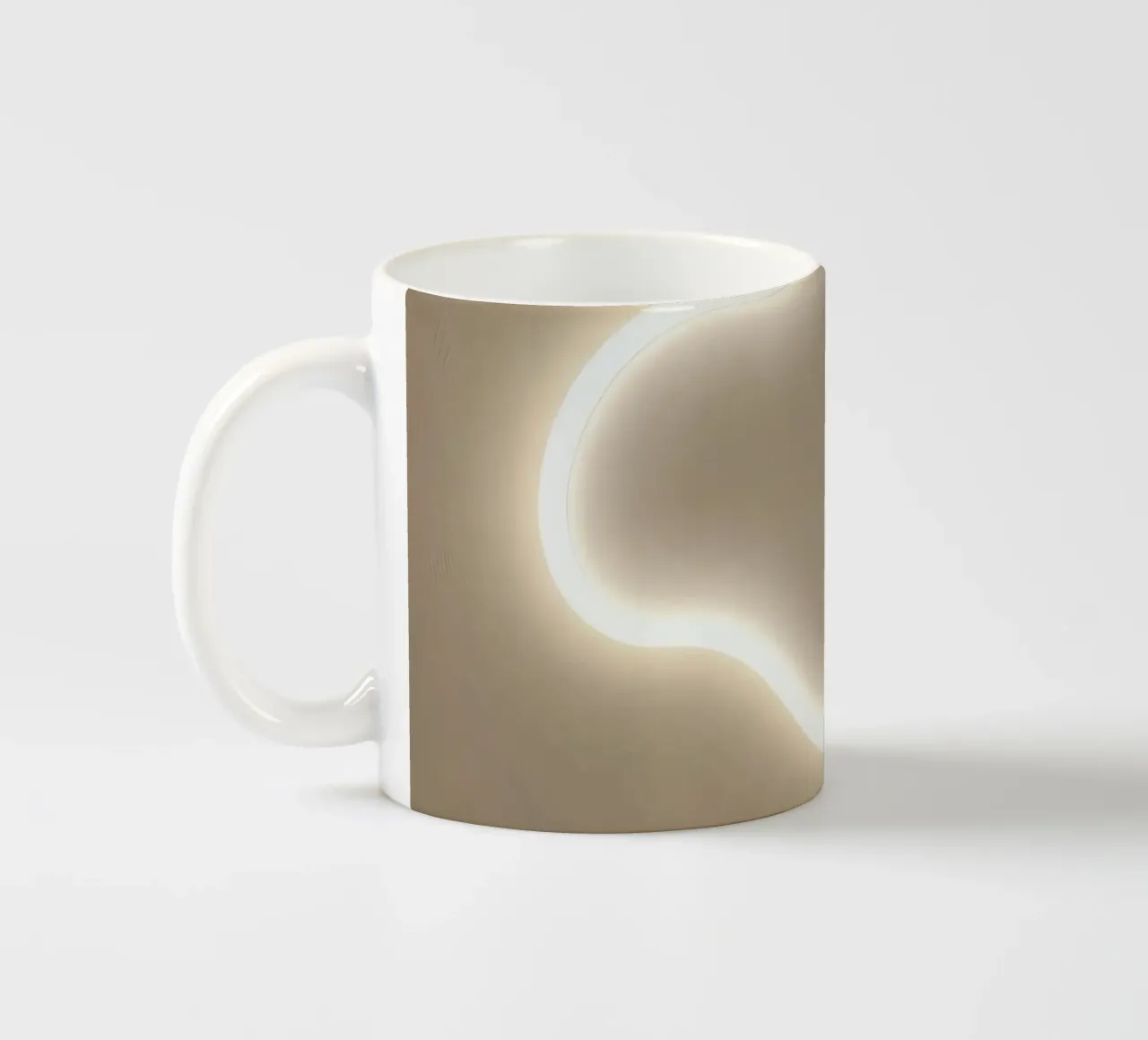 L'installazione della luce crea un bagliore morbido su una parete neutra tazza in ceramica da DesignDoodle