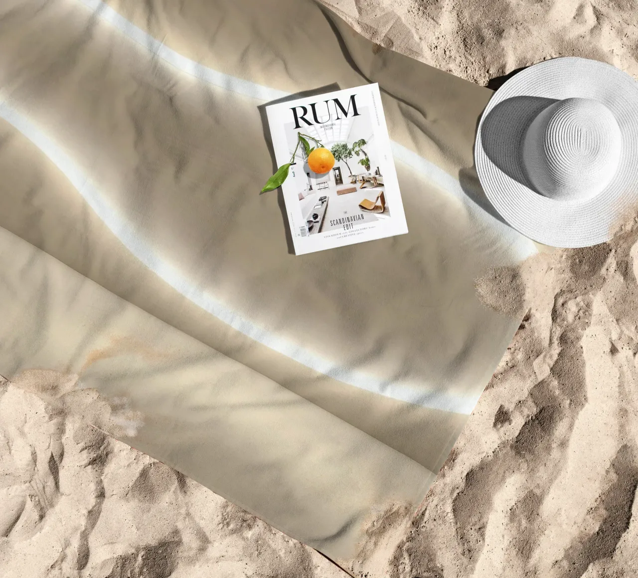 Light installation creates soft glow against neutral wall beach towel by DesignDoodle