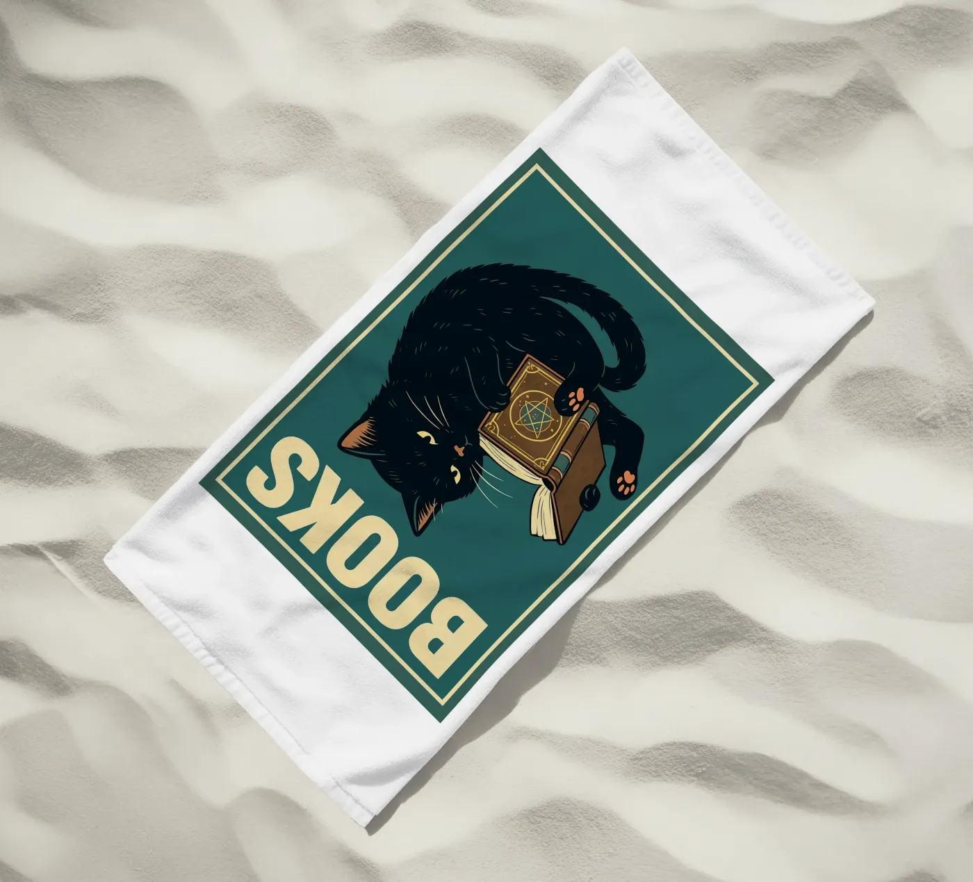 gatto e libro telo mare da the gan gan