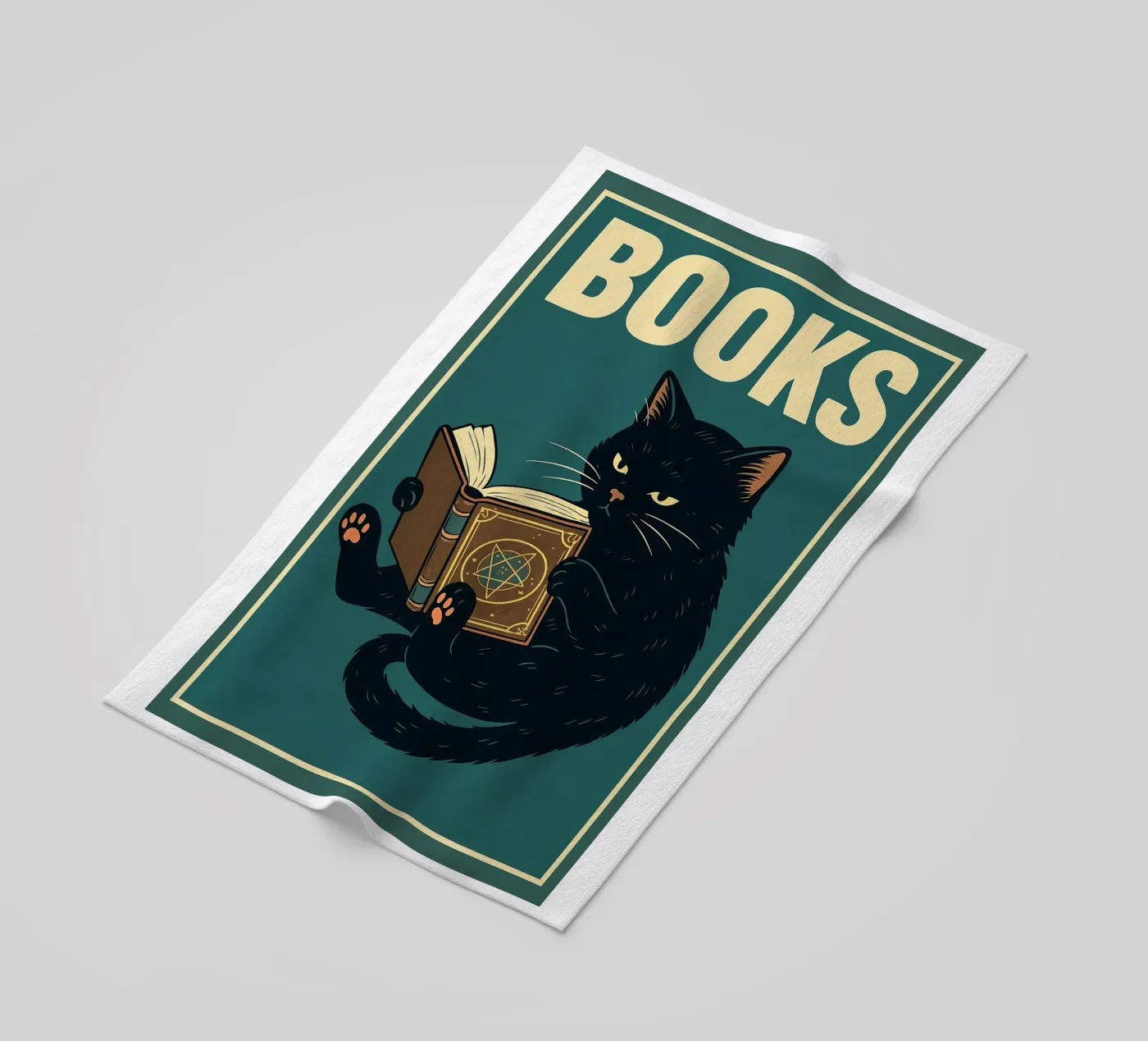 gatto e libro telo mare da the gan gan