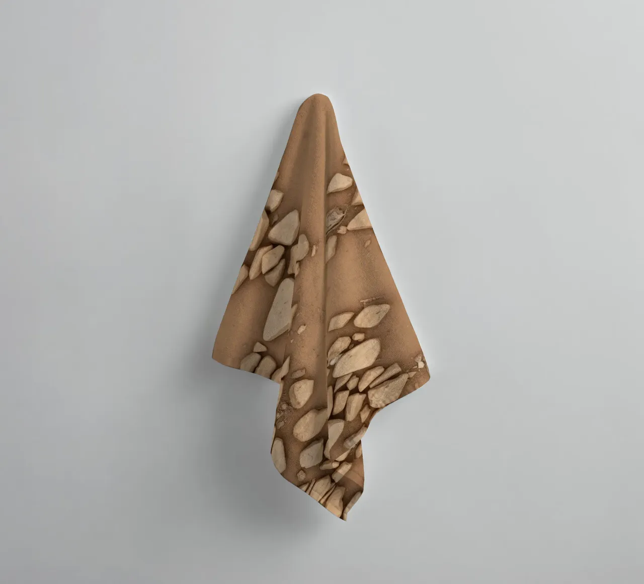 Disposizione naturale di piccole pietre sparse su un fondo marrone asciugamano da bagno da DesignDoodle