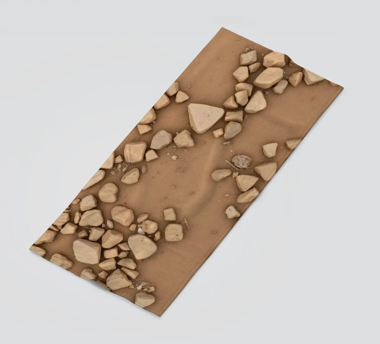 Disposizione naturale di piccole pietre sparse su un fondo marrone telo mare da DesignDoodle