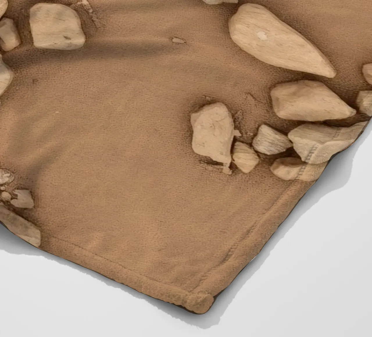 Disposizione naturale di piccole pietre sparse su un fondo marrone coperta in pile da DesignDoodle