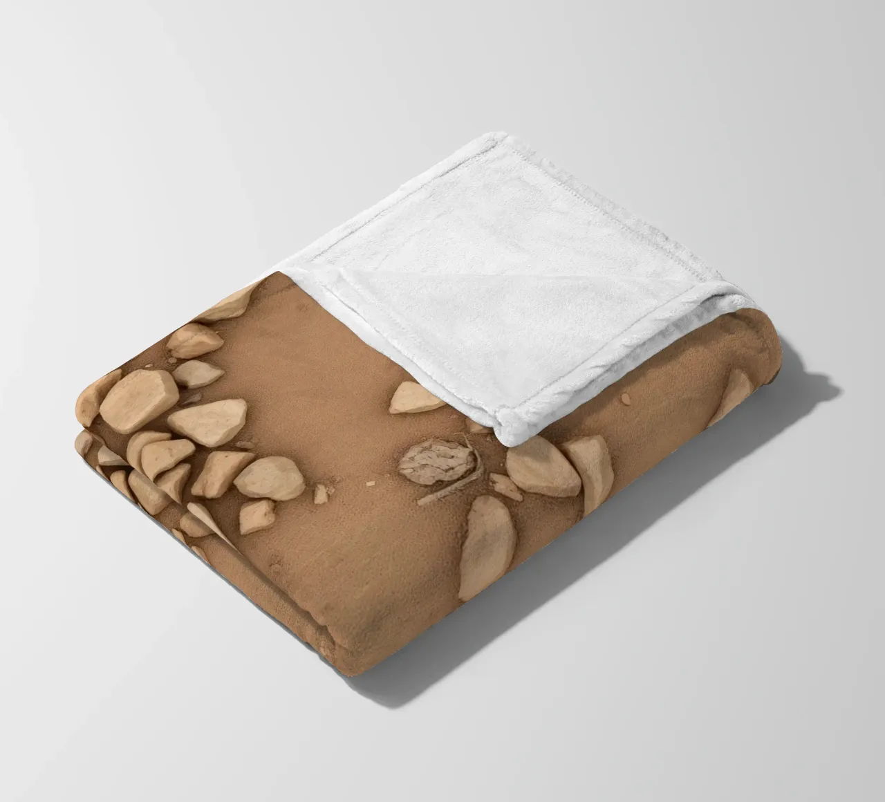 Disposizione naturale di piccole pietre sparse su un fondo marrone coperta in pile da DesignDoodle