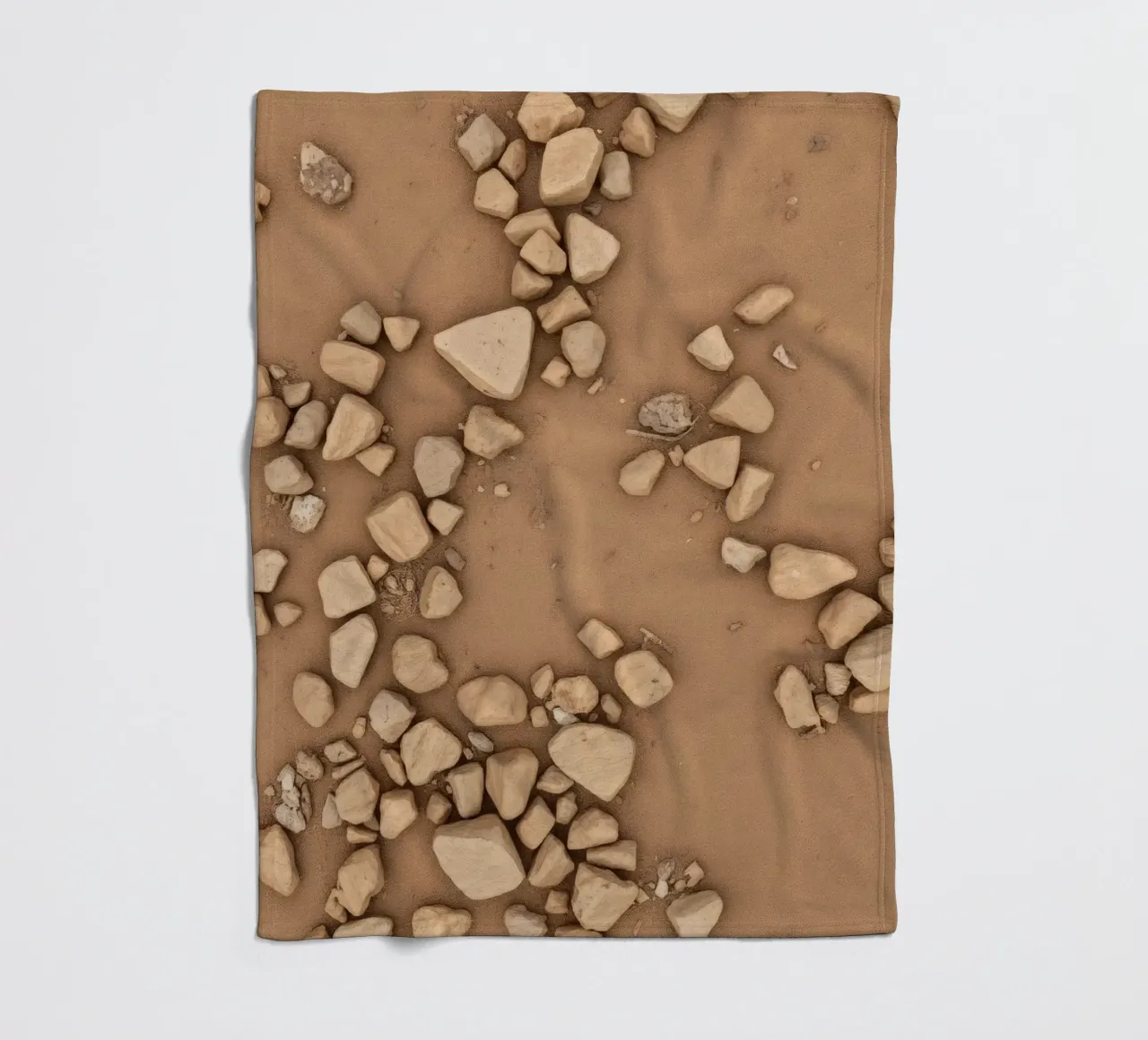 Disposizione naturale di piccole pietre sparse su un fondo marrone coperta in pile da DesignDoodle