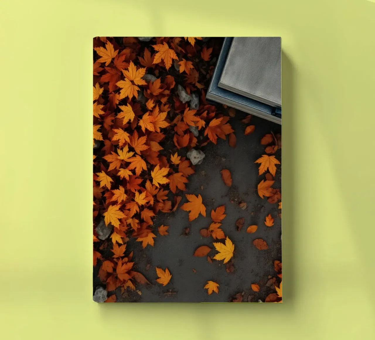 Golden autumn leaves scatter on the ground near a stone path notebook by DesignDoodle