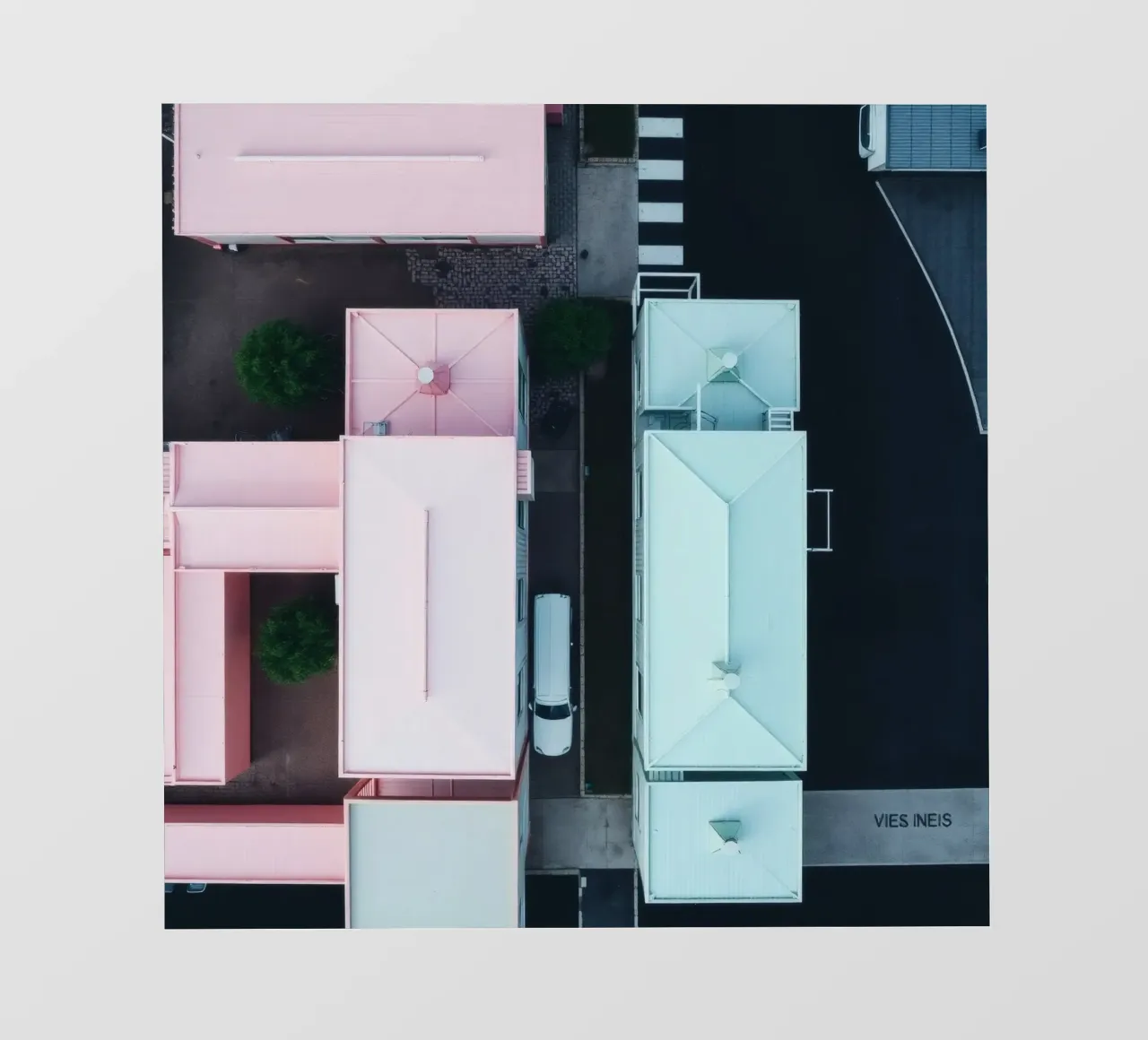 Unique aerial view of pastel-colored buildings with trees pvc cover by DesignDoodle
