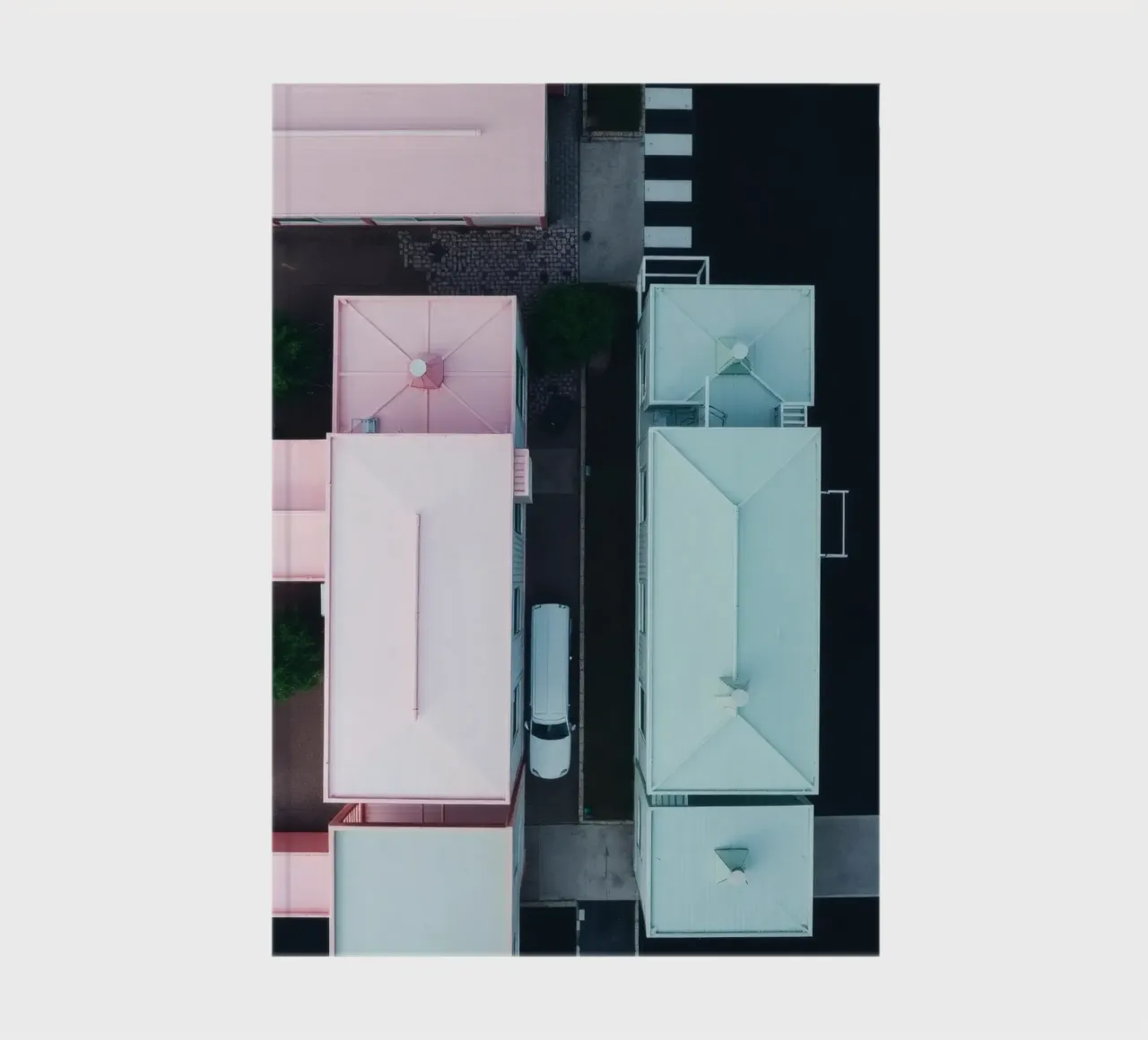 Unique aerial view of pastel-colored buildings with trees notebook by DesignDoodle