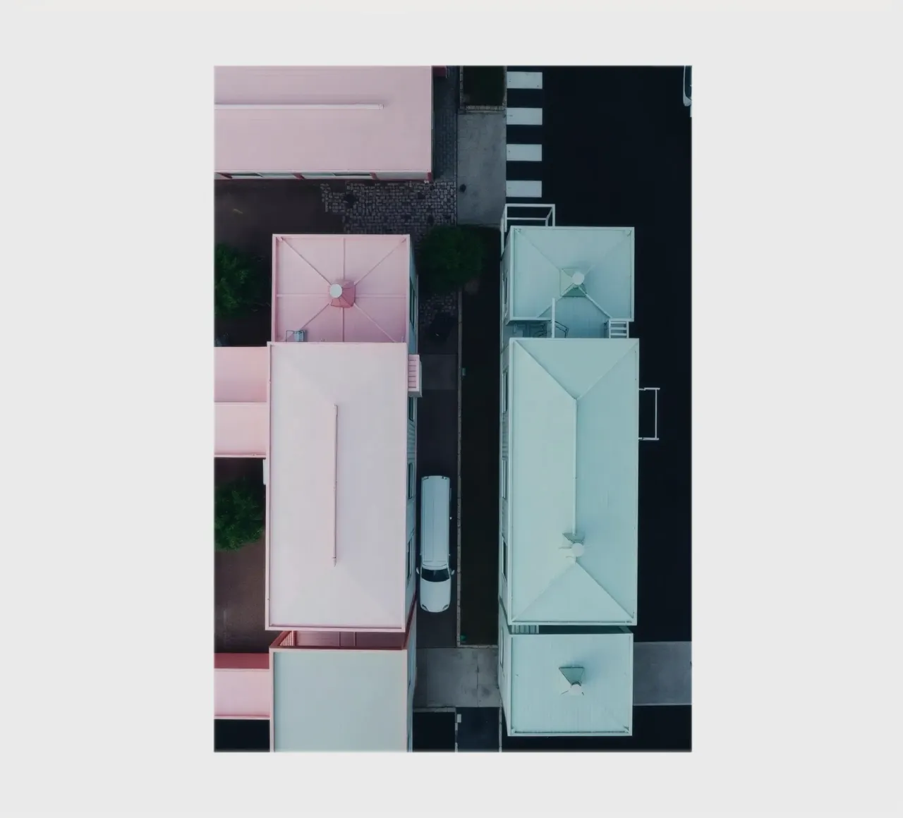 Unique aerial view of pastel-colored buildings with trees notebook by DesignDoodle