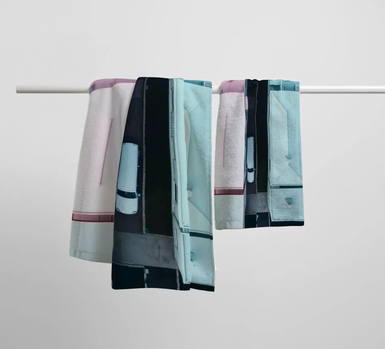 Unique aerial view of pastel-colored buildings with trees towel by DesignDoodle
