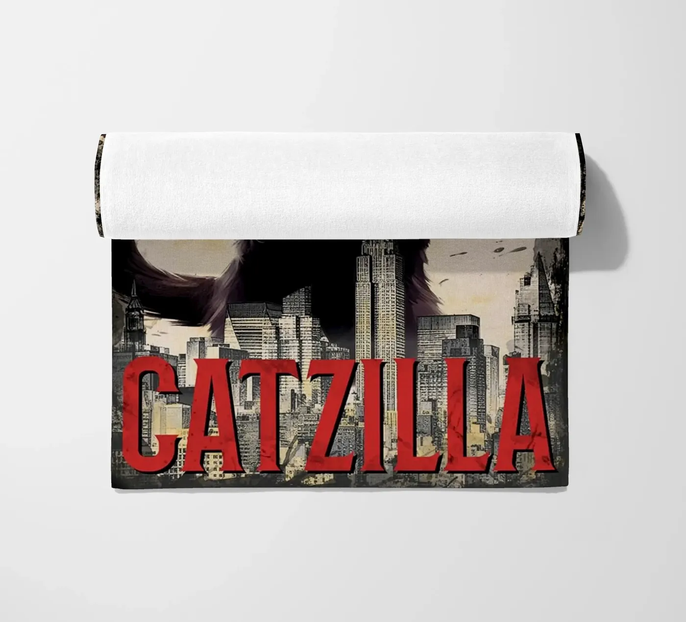 The Catzilla beach towel by Betty Shops