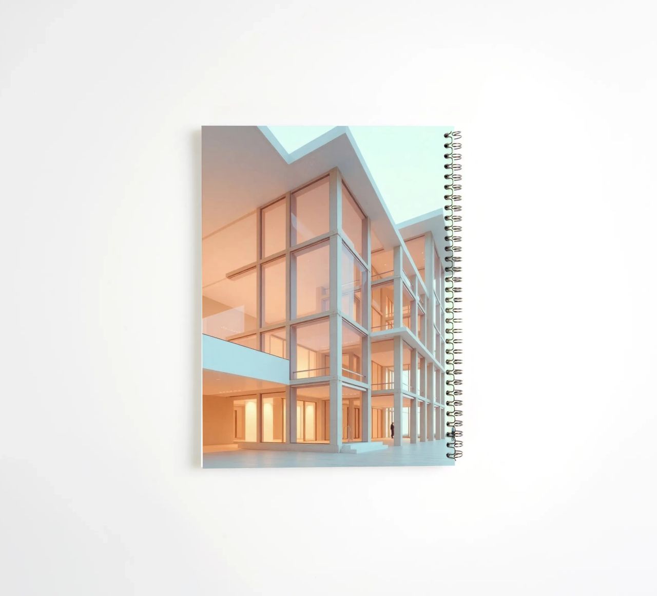 Modern architectural design with spacious open areas and spiral notebook by DesignDoodle
