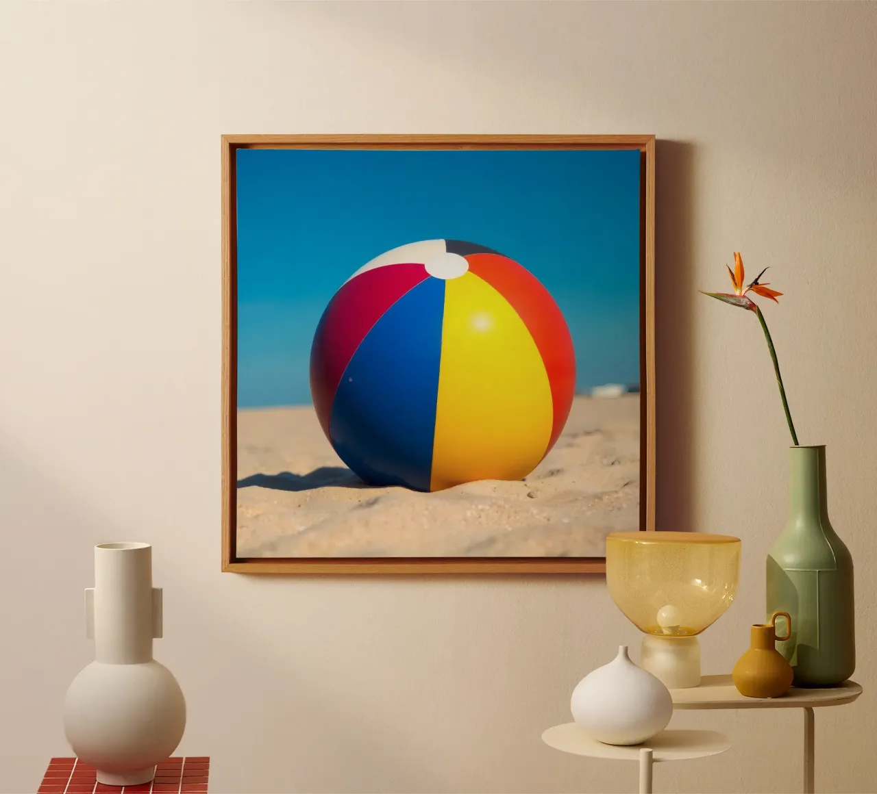 un ballon de plage est posé sur un rivage sablonneux sous un ciel bleu éclatant. toile avec Caisse américaine de DesignDoodle