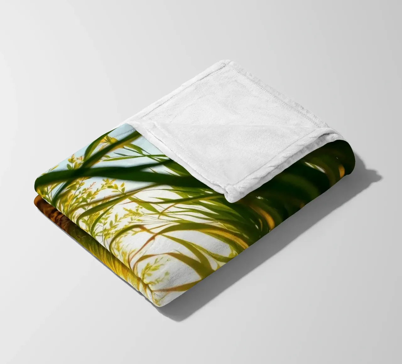 Sunlight filters through tall grass in a calm field fleece blanket by DesignDoodle