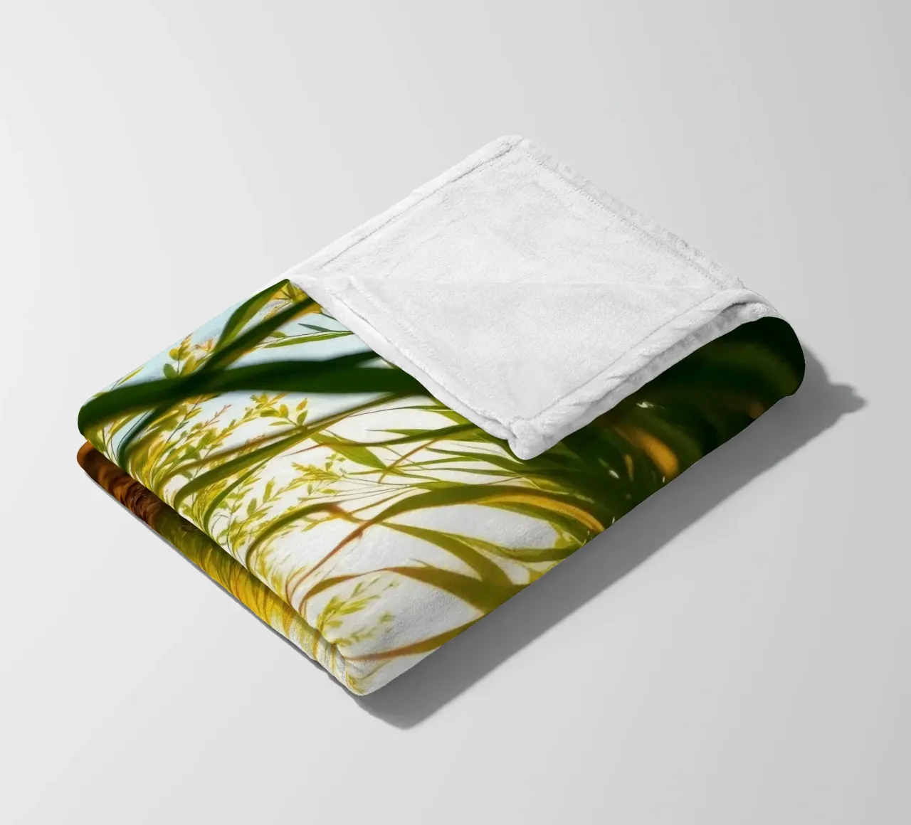 Sunlight filters through tall grass in a calm field fleece blanket by DesignDoodle