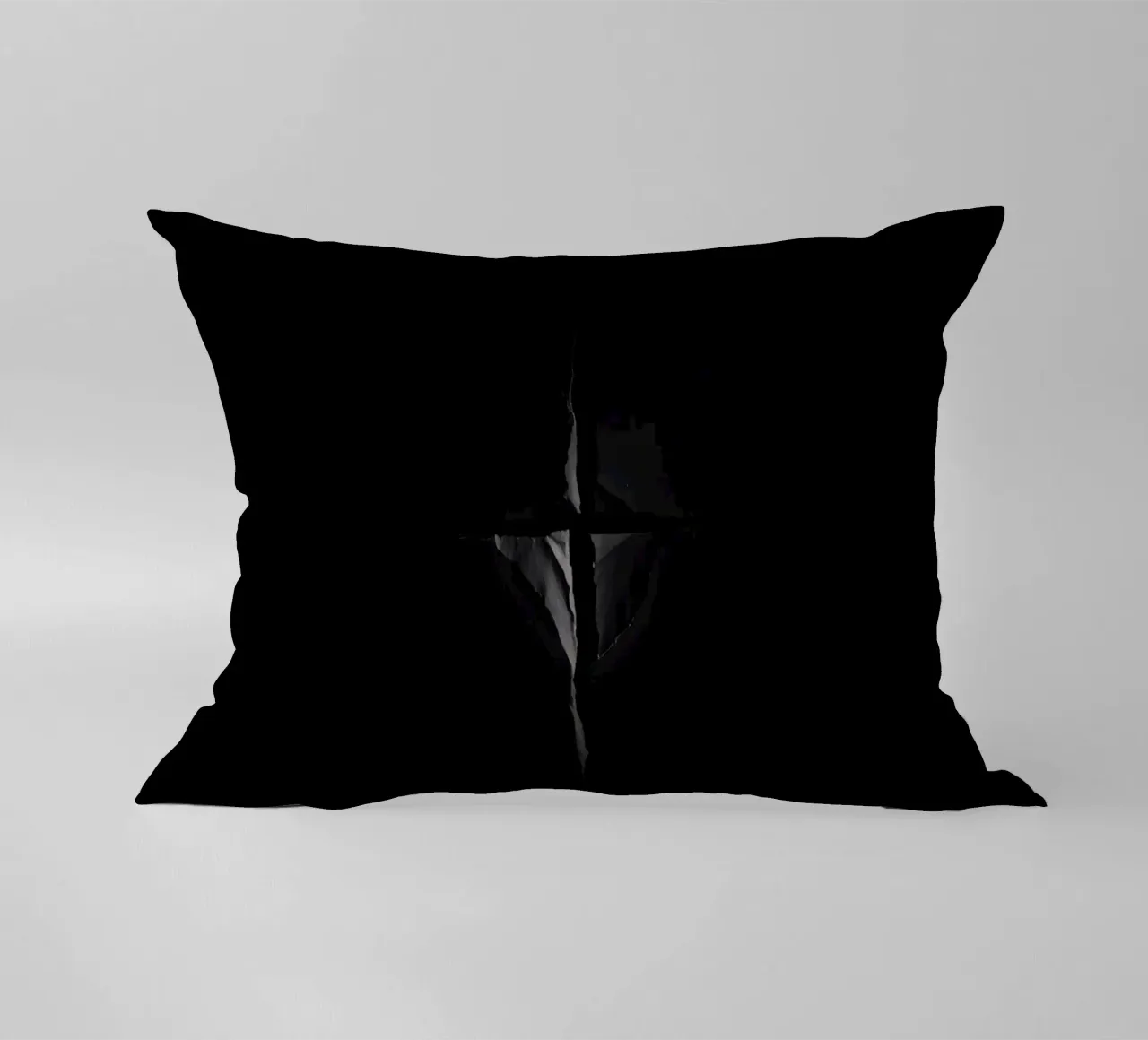 Una crepa scura in una superficie rivela una luce sottile cuscino da DesignDoodle