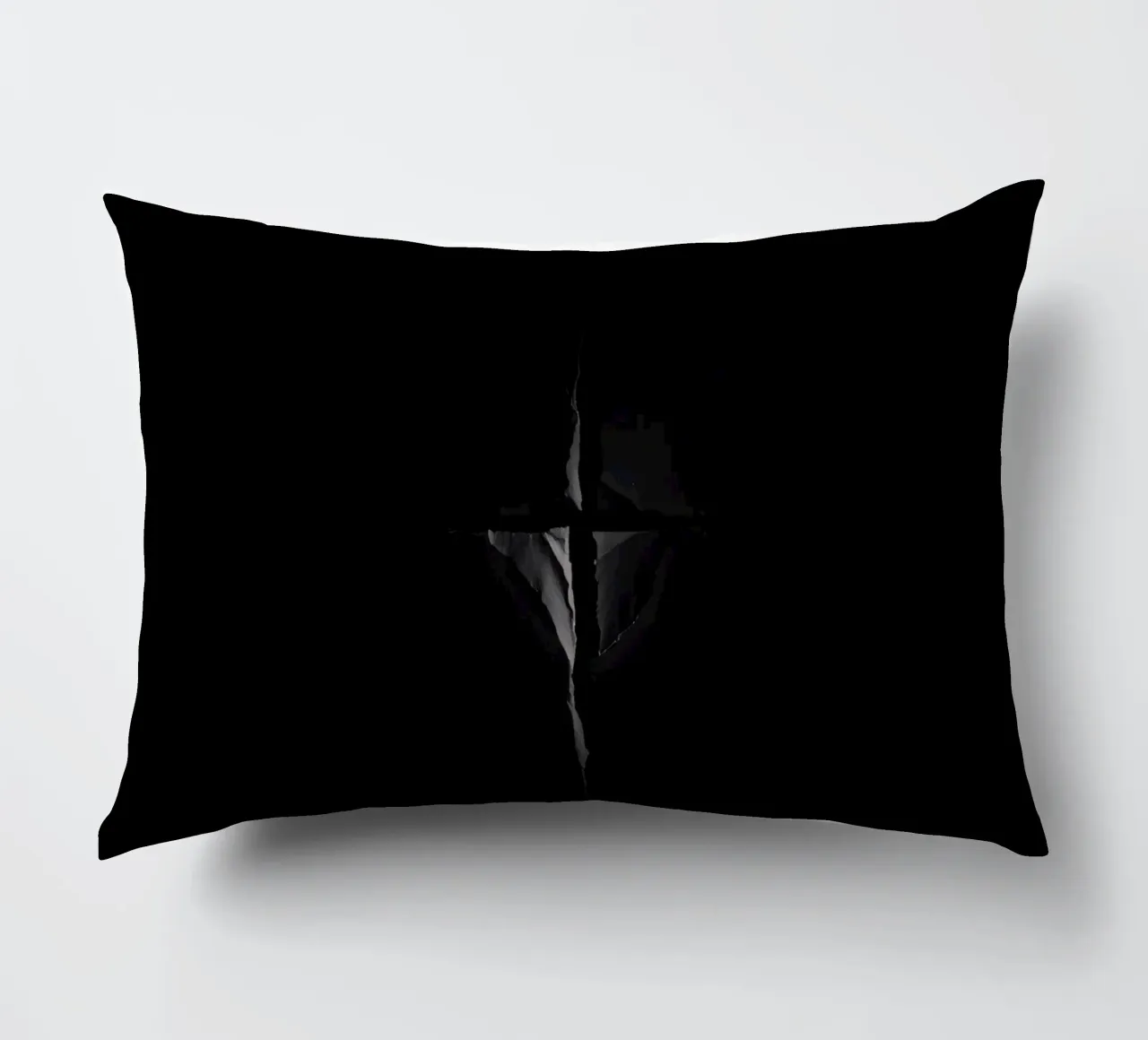 Una crepa scura in una superficie rivela una luce sottile cuscino da DesignDoodle
