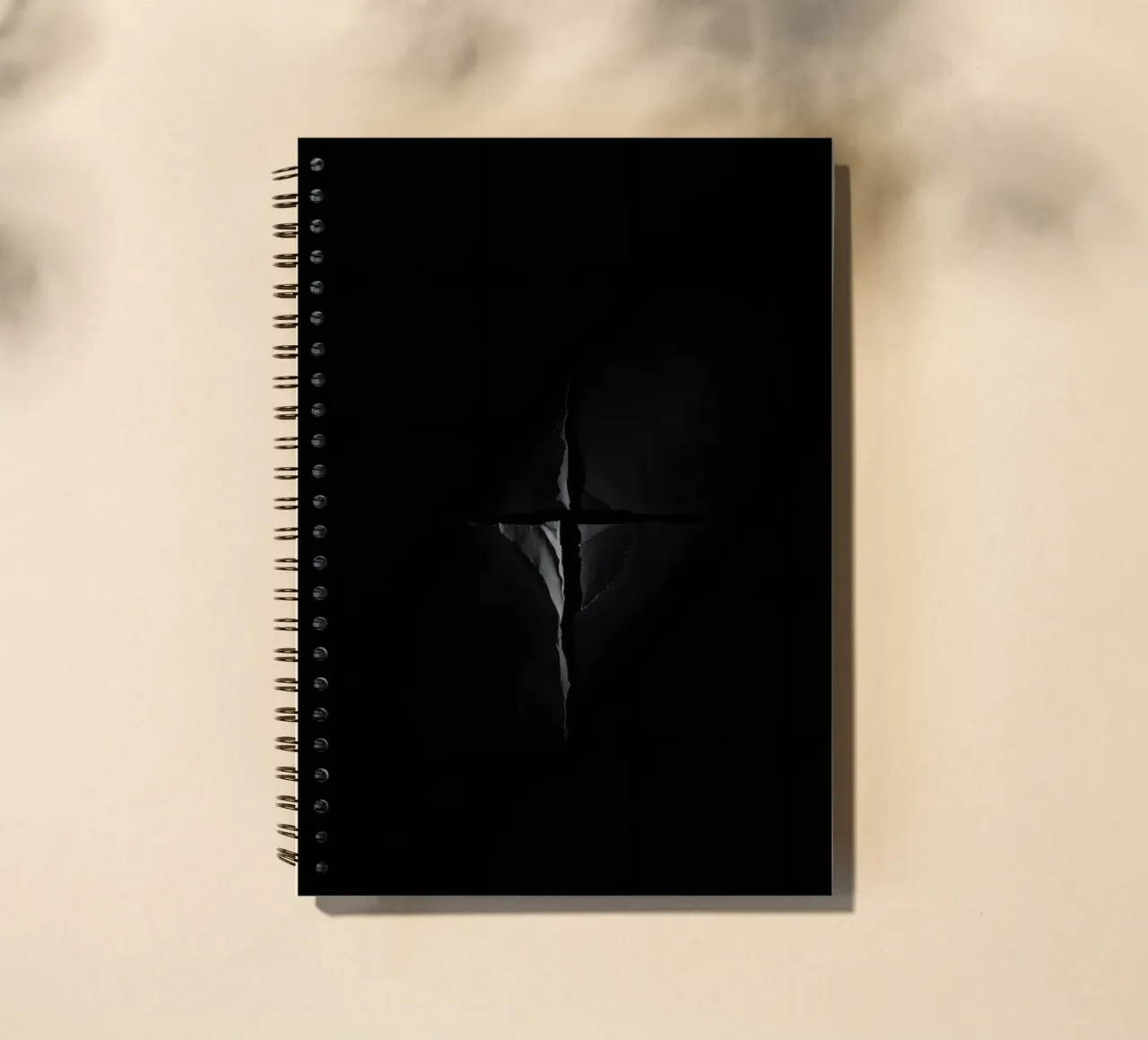 Dark crack in a surface reveals subtle light spiral notebook by DesignDoodle