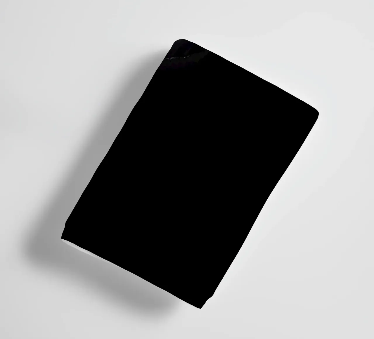 Une fissure sombre dans une surface révèle une lumière subtile serviette de bain de DesignDoodle