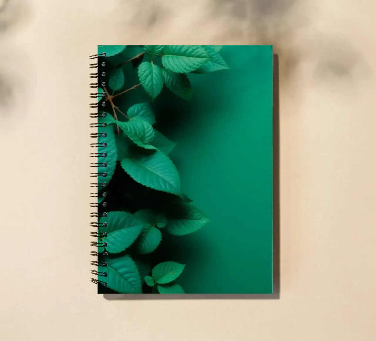 Lush green leaves create a backdrop in a calming nature spiral notebook by DesignDoodle