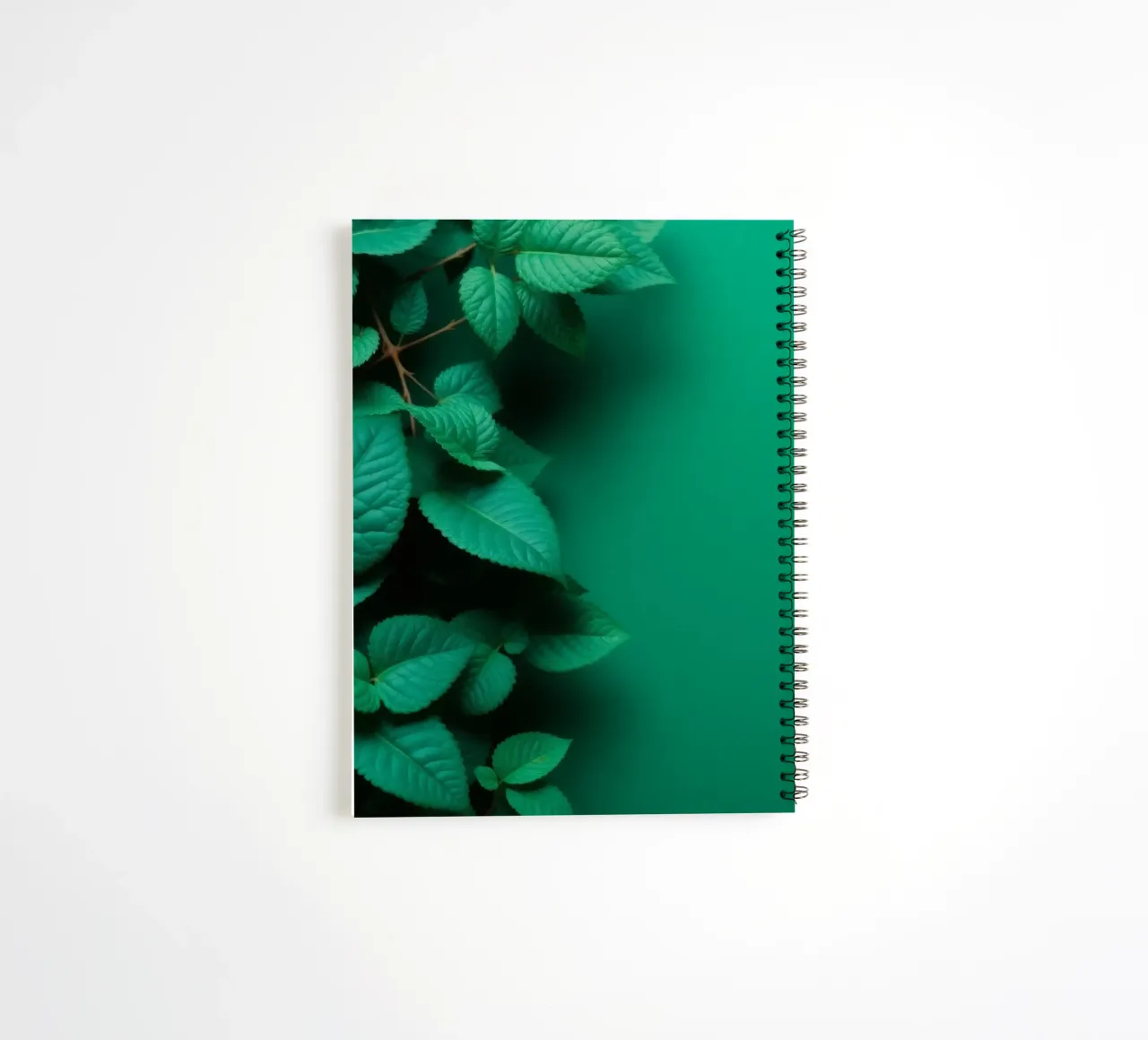 Lush green leaves create a backdrop in a calming nature spiral notebook by DesignDoodle