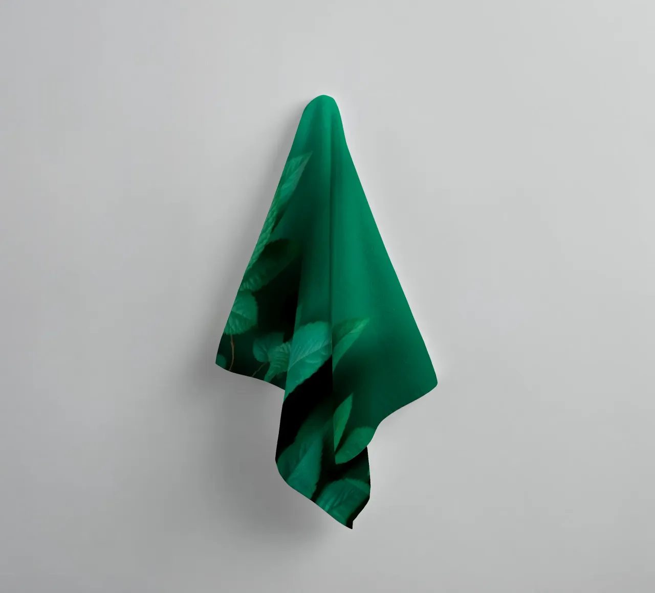 Lush green leaves create a backdrop in a calming nature towel by DesignDoodle