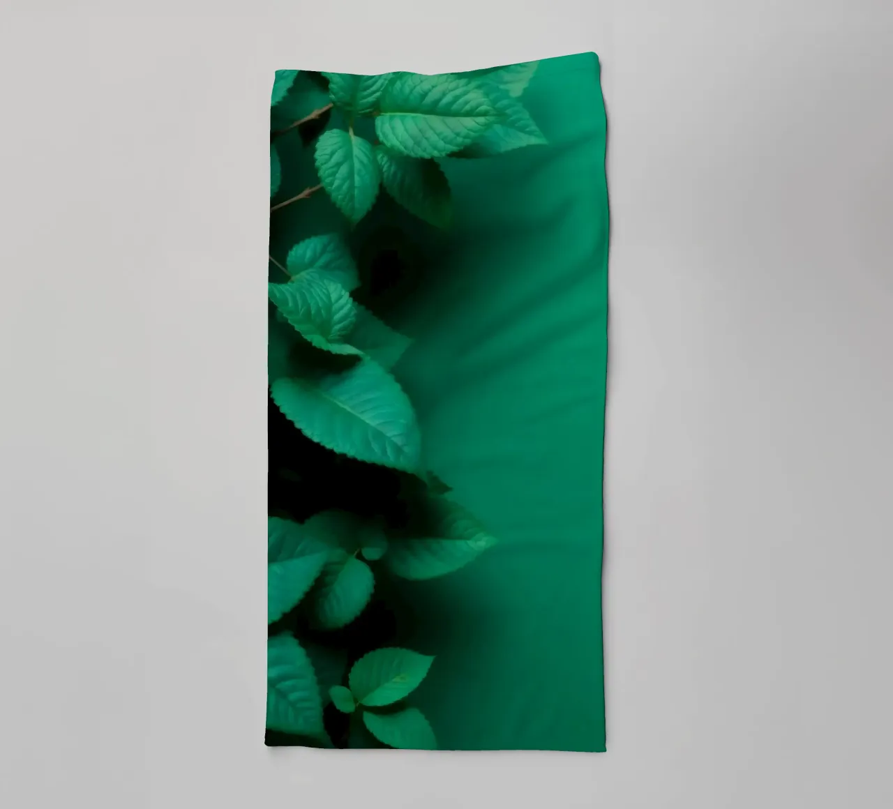 Lush green leaves create a backdrop in a calming nature towel by DesignDoodle