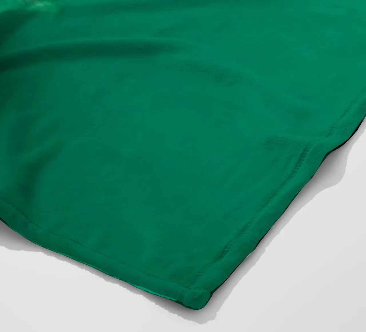 Lush green leaves create a backdrop in a calming nature fleece blanket by DesignDoodle