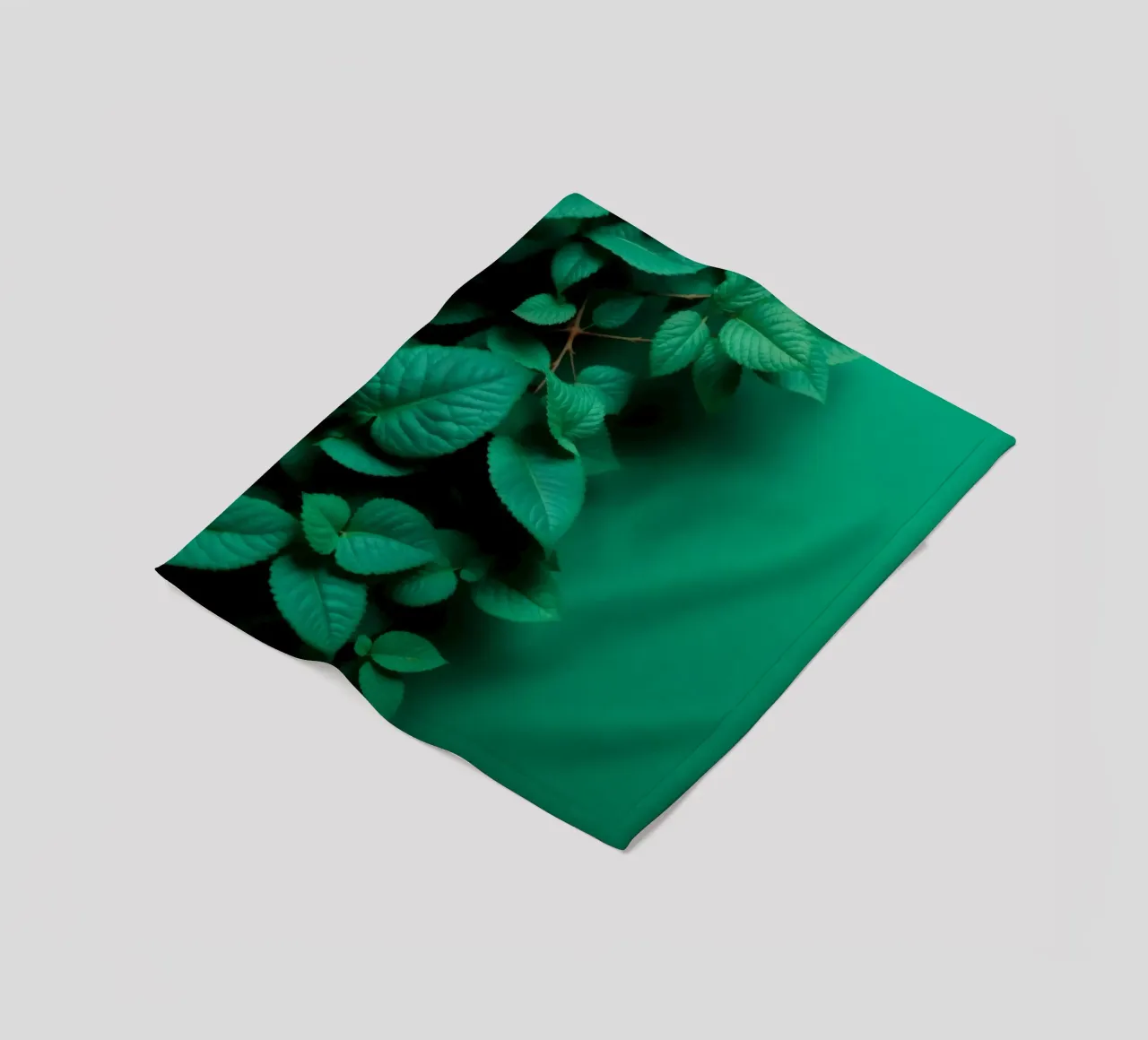 Lush green leaves create a backdrop in a calming nature fleece blanket by DesignDoodle
