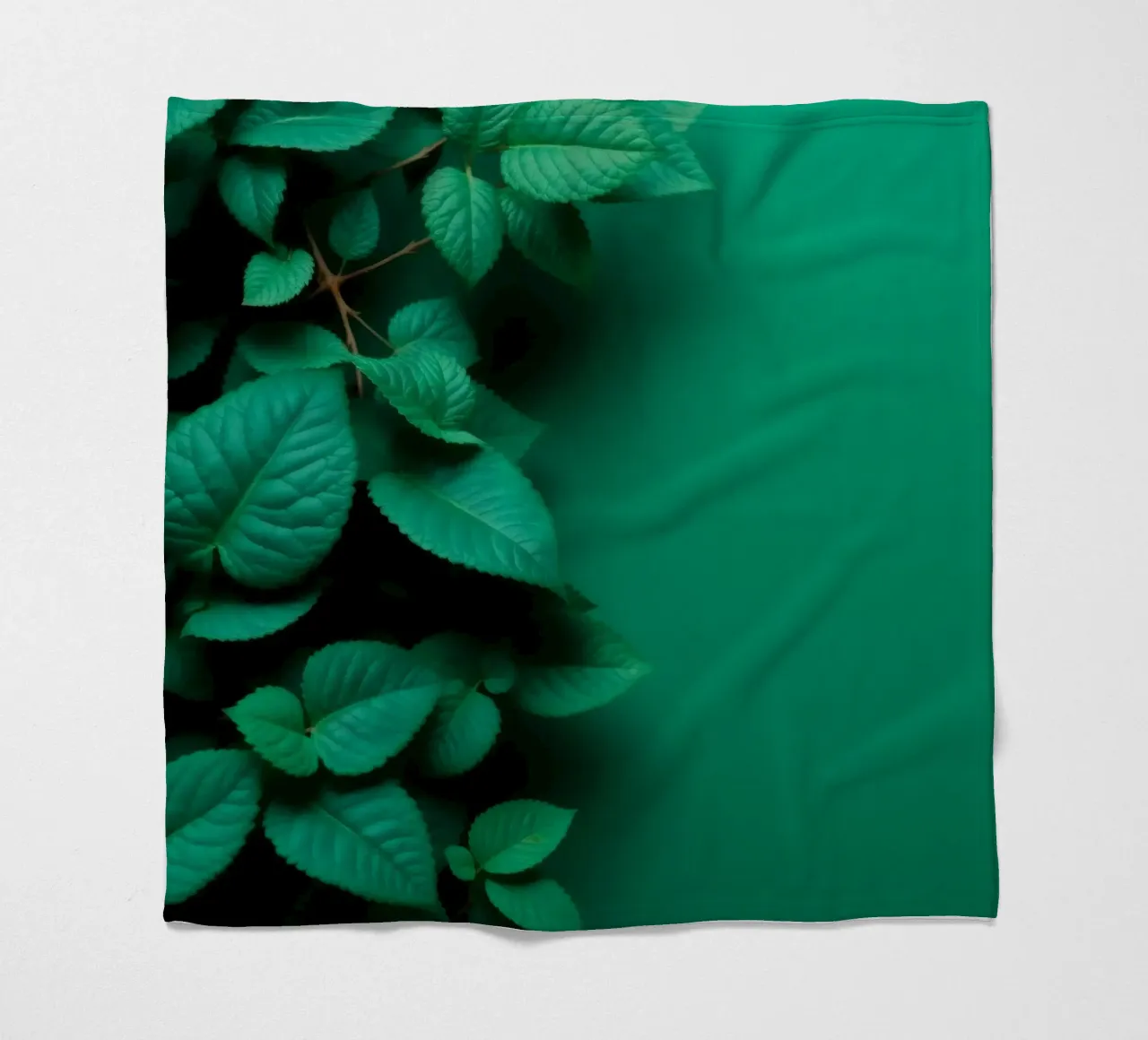 Lush green leaves create a backdrop in a calming nature fleece blanket by DesignDoodle