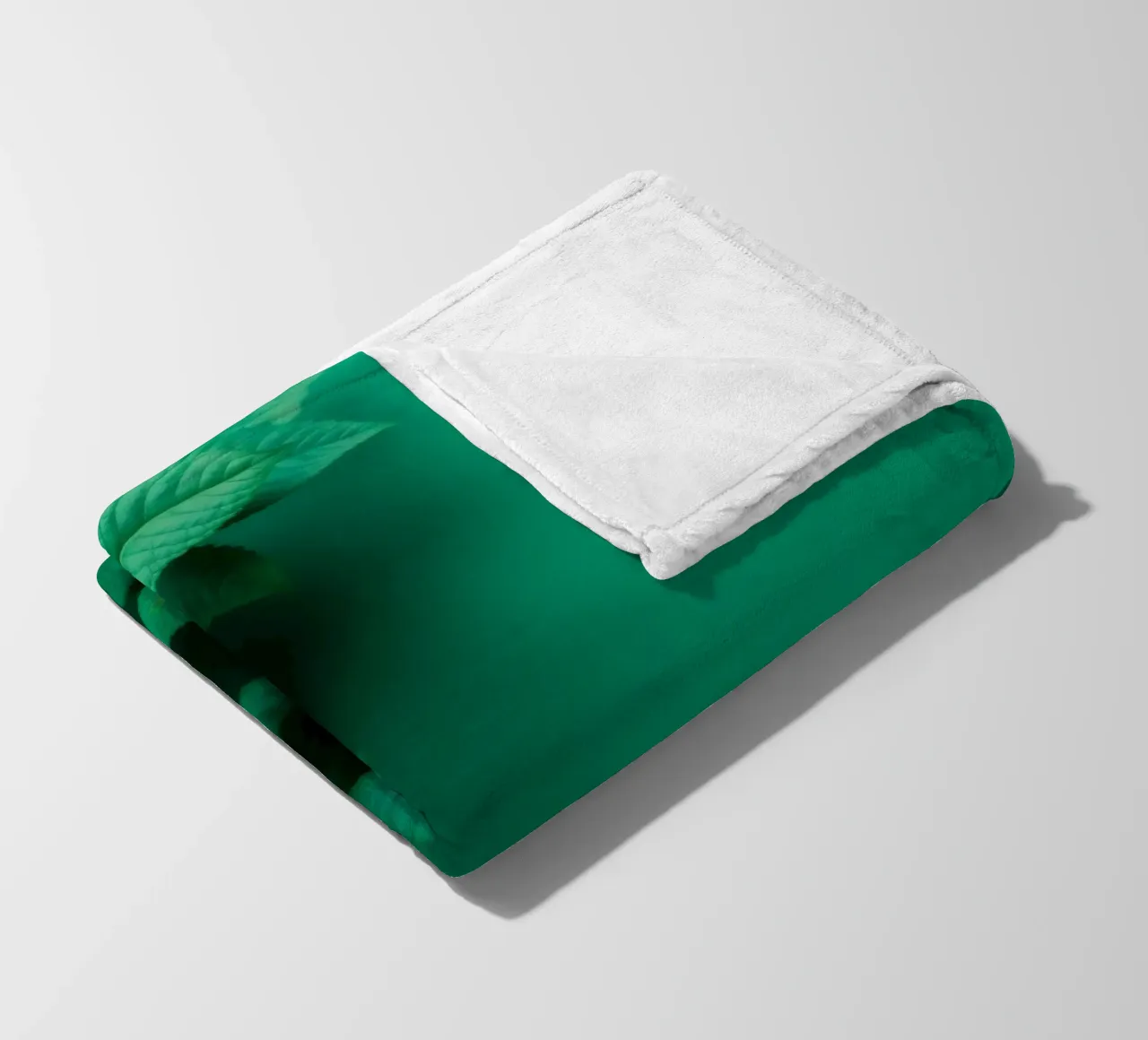 Lush green leaves create a backdrop in a calming nature fleece blanket by DesignDoodle