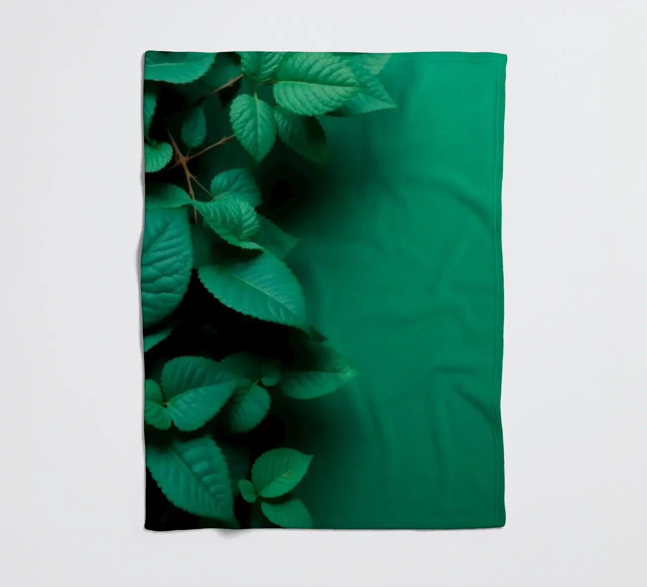 Lush green leaves create a backdrop in a calming nature fleece blanket by DesignDoodle