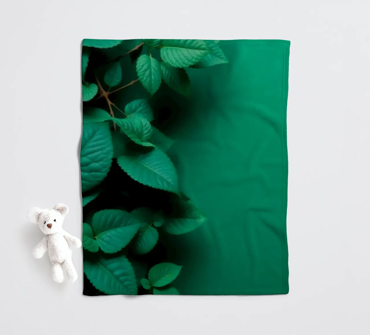 Lush green leaves create a backdrop in a calming nature fleece blanket by DesignDoodle